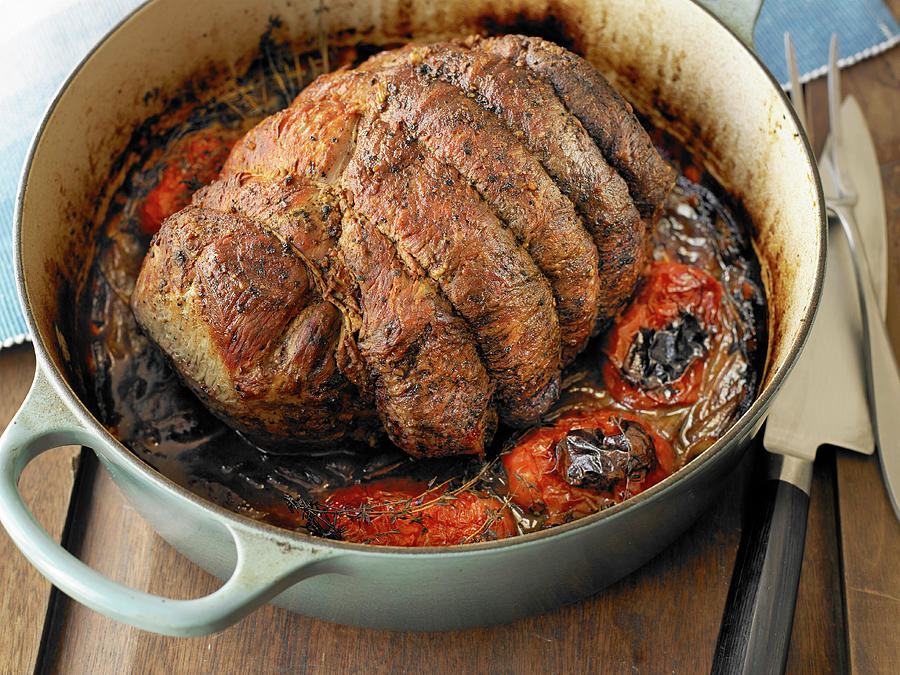 Beef Roast With Melted Tomatoes And Onions #1 Photograph by Michael Kraus