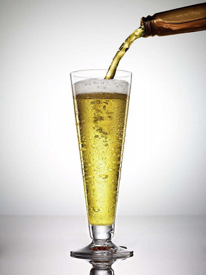 Beer On White Background Photograph by Bill Diodato