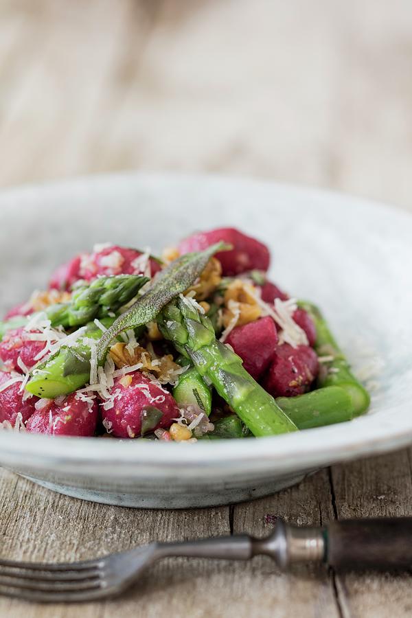 Beetroot Gnocchi With Green Asparagus, Walnuts And Sage #1 Photograph by Jan Wischnewski