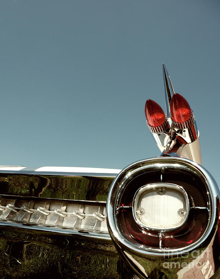 Big taillight of a classic car #1 Photograph by Andreas Berheide