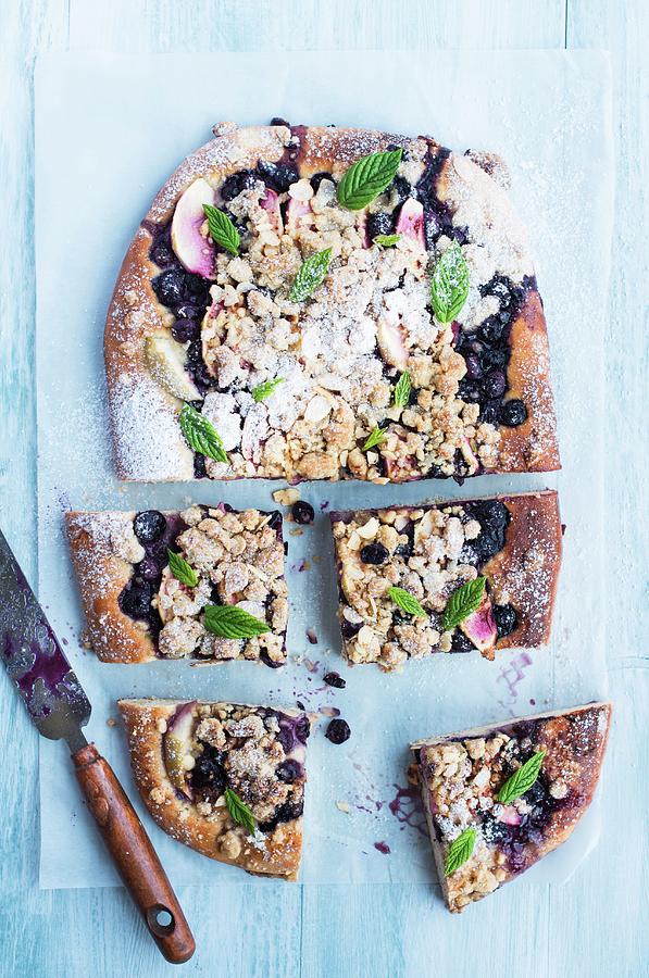 Blueberry And Apple Crumble Yeast Cake Garnished With Fresh Mint #1 Photograph by Magdalena Hendey