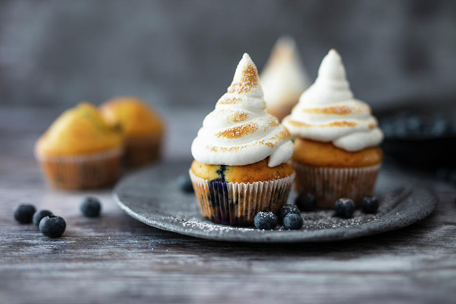 Blueberry Muffins With Flamed Meringue #1 Photograph by Jan Wischnewski
