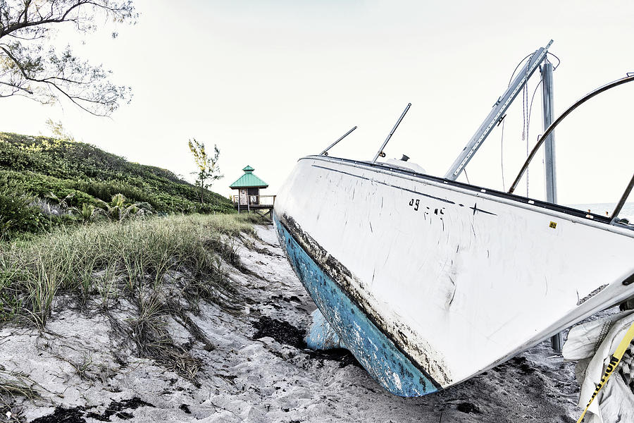 Boat Wreck On Beach With Lifeguard Tower In Background #1 Digital Art by Laura Diez