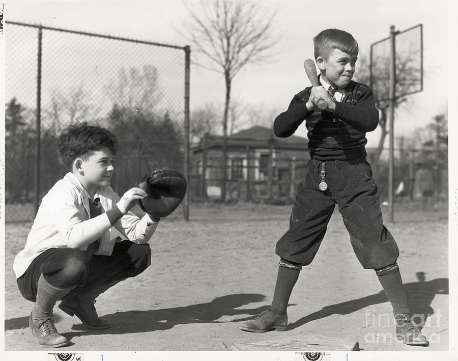 little boy playing baseball