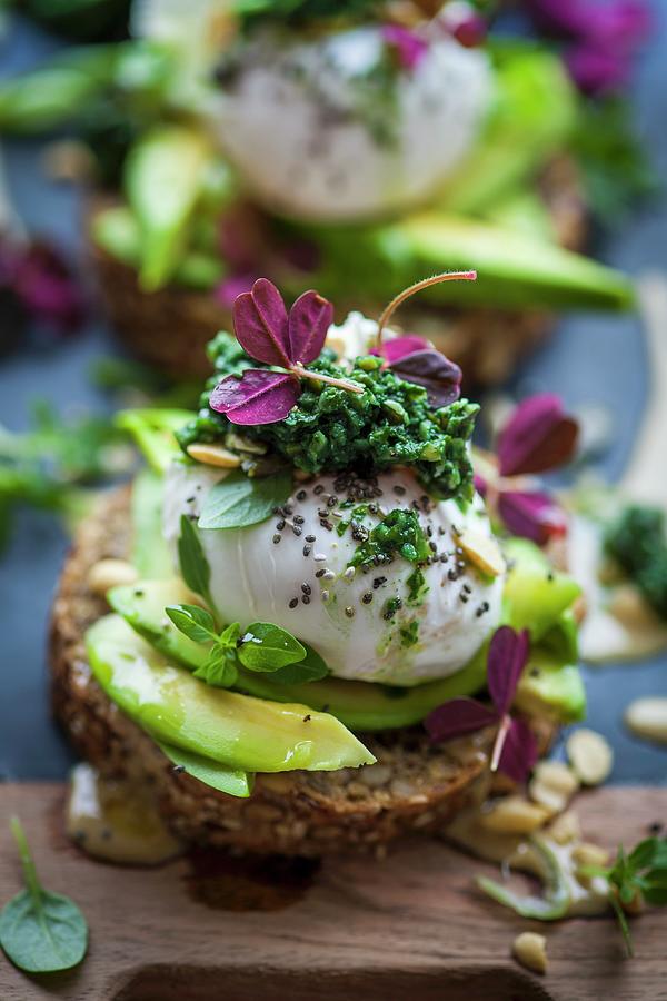 Bread Topped With Avocado, A Poached Egg, And Green Cabbage Tapenade superfood #1 Photograph by Eising Studio