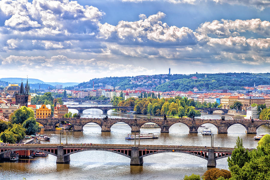 Bridge and rooftops of Prague #6 Photograph by Vivida Photo PC