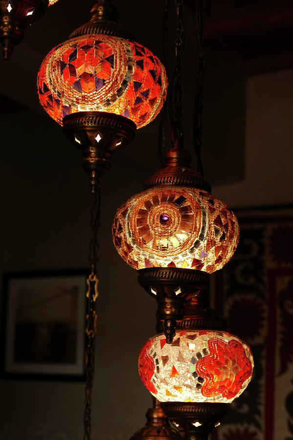 Bright glass lantern globes in a luxury hotel #1 Photograph by Steve Estvanik