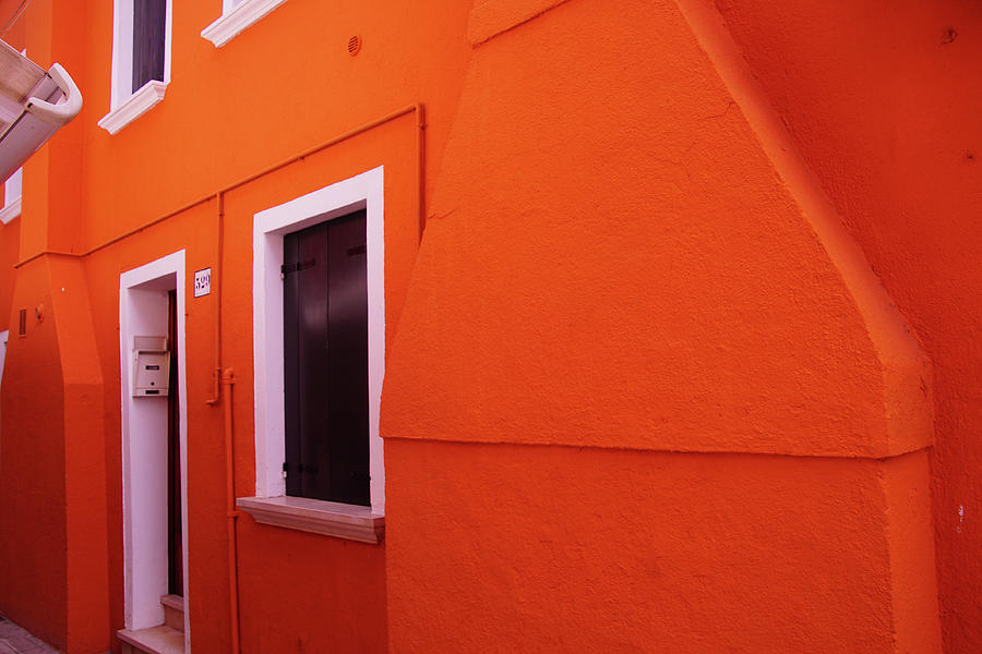 Brightly colored houses of Burano #1 Photograph by Steve Estvanik
