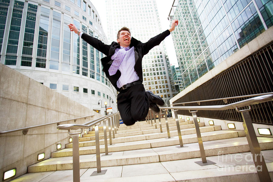Businessman Jumping For Joy #1 Photograph by Conceptual Images/science Photo Library