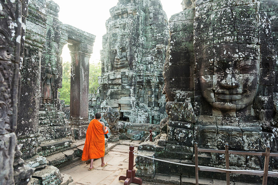 Cambodia, Siemreab, Angkor, Young Monk Walking Through The Bayan Temple #1 Digital Art by Jordan Banks