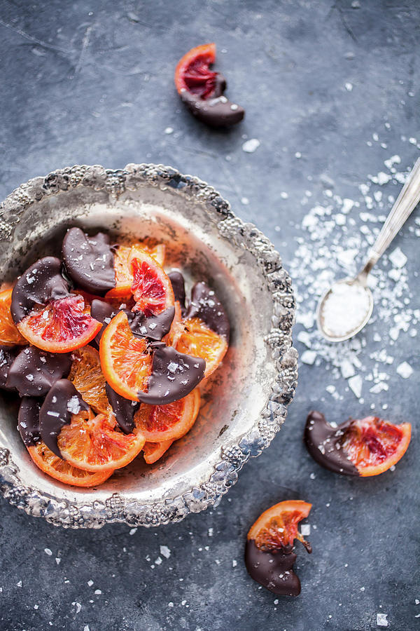 Candied Blood Oranges Dipped In Chocolate And Sprinkled With Finger Salt #1 Photograph by Kati Finell