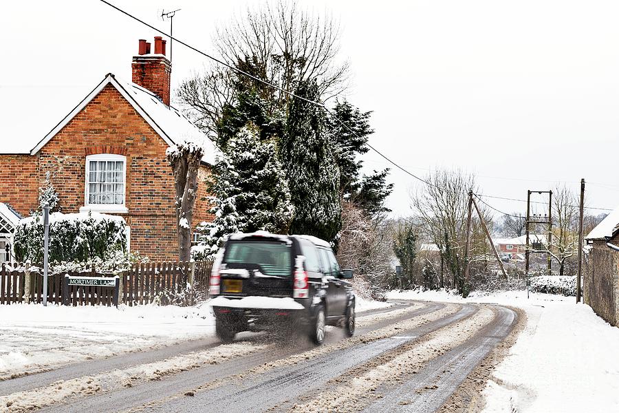 Car Driving In Snowy Conditions #1 Photograph by Stephen Burt/science Photo Library
