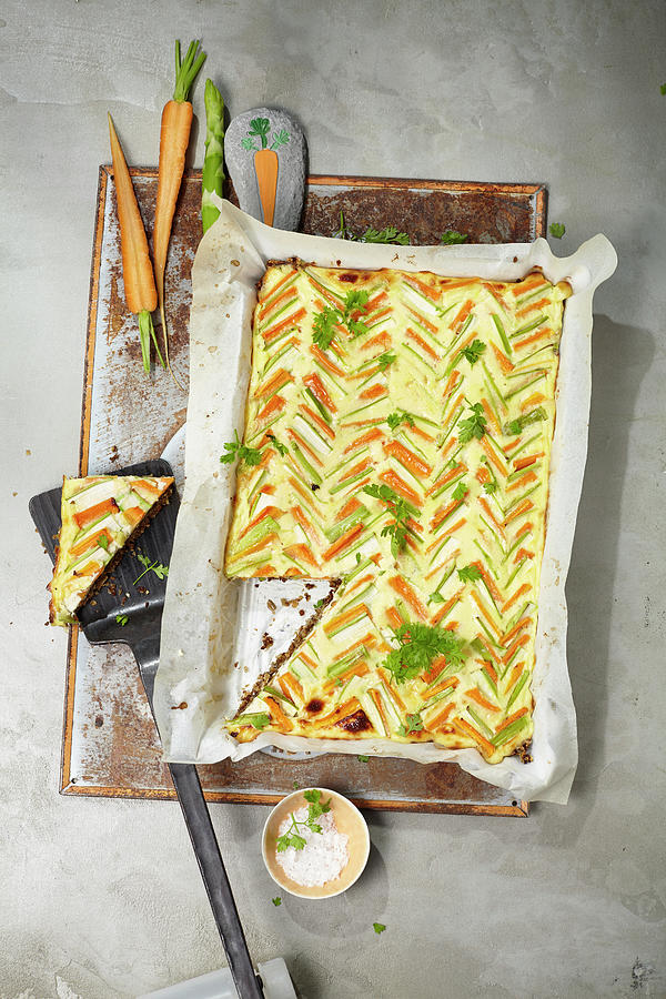 Carrot And Asparagus Tart With Pumpernickel #1 Photograph by Ulrike Stockfood Studios / Holsten