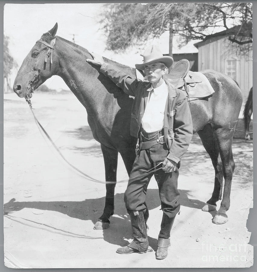 Cattleman Posing With Horse #1 Photograph by Bettmann