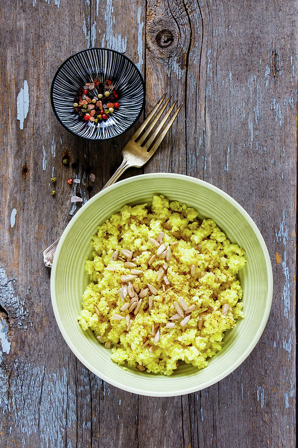 Cauliflower Rice With Spices And Sunflower Seeds #1 Photograph by Yuliya Gontar