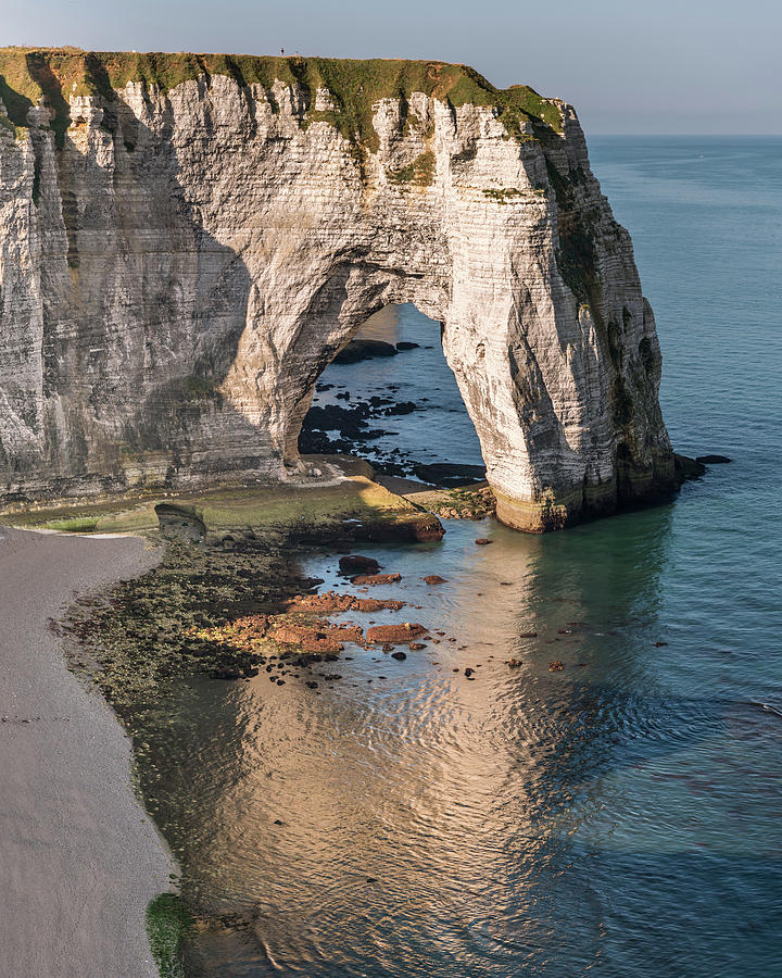 Chalk cliffs of Etretat with the natural arch called Manneporte