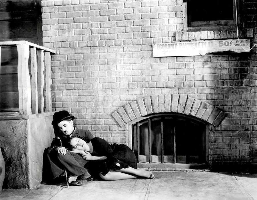 CHARLIE CHAPLIN and PAULETTE GODDARD in MODERN TIMES -1936-. #1 Photograph by Album