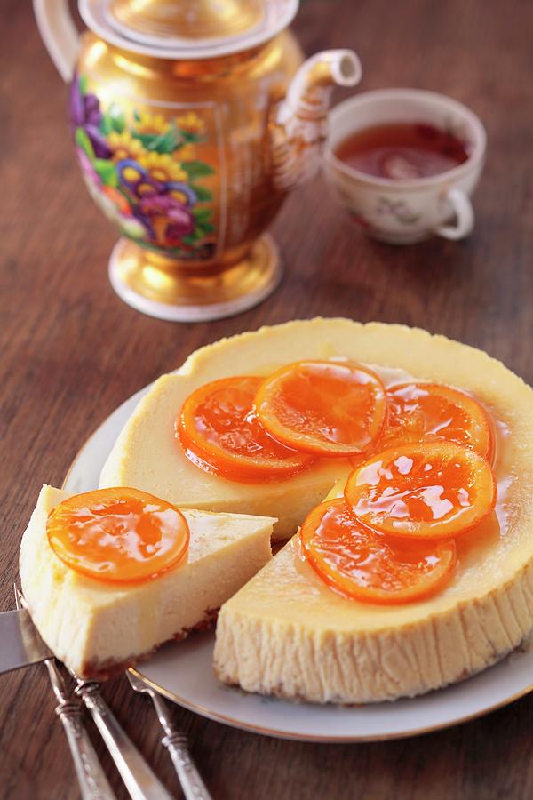 Cheesecake With Oranges Served With Tea #1 Photograph by Lukasz Zandecki