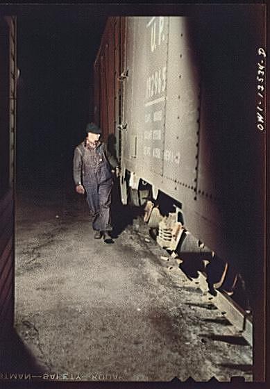 Chicago, Illinois. Hump helper uncoupling cars 1942 #1 Painting by Celestial Images