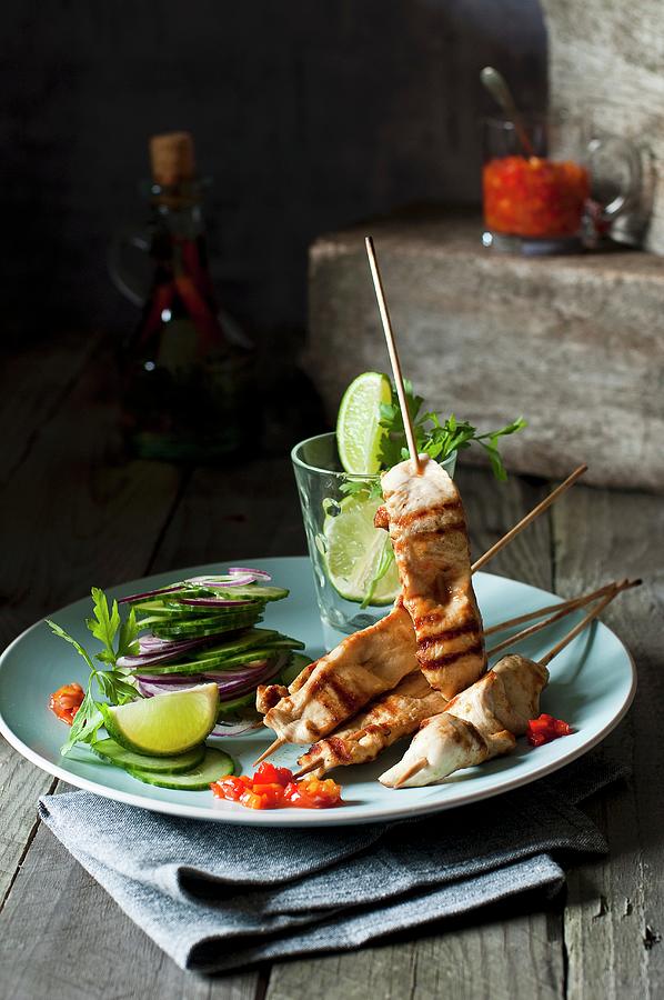 Chicken Skewers With Cucumber Salad And Chilli Sauce #1 Photograph by Tomasz Jakusz