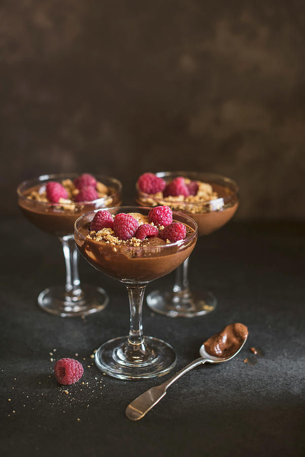 Chocolate Mousse With Amaretti Biscuits And Fresh Raspberries #1 Photograph by Magdalena Hendey