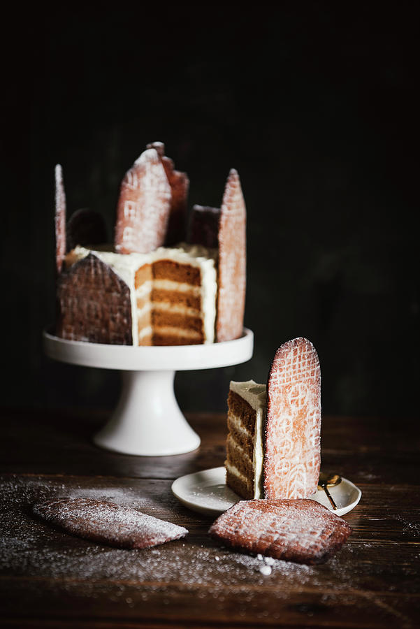 Christmas Cake Decorated With Gingerbread Houses #1 Photograph by Justina Ramanauskiene