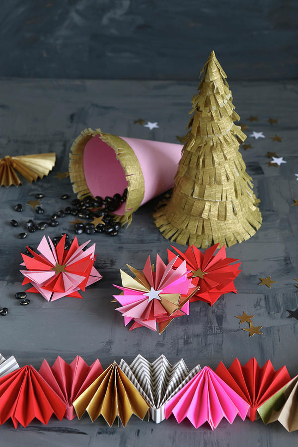 Christmas Decorations Hand-made From Pink, Red And Gold Paper #1 Photograph by Regina Hippel