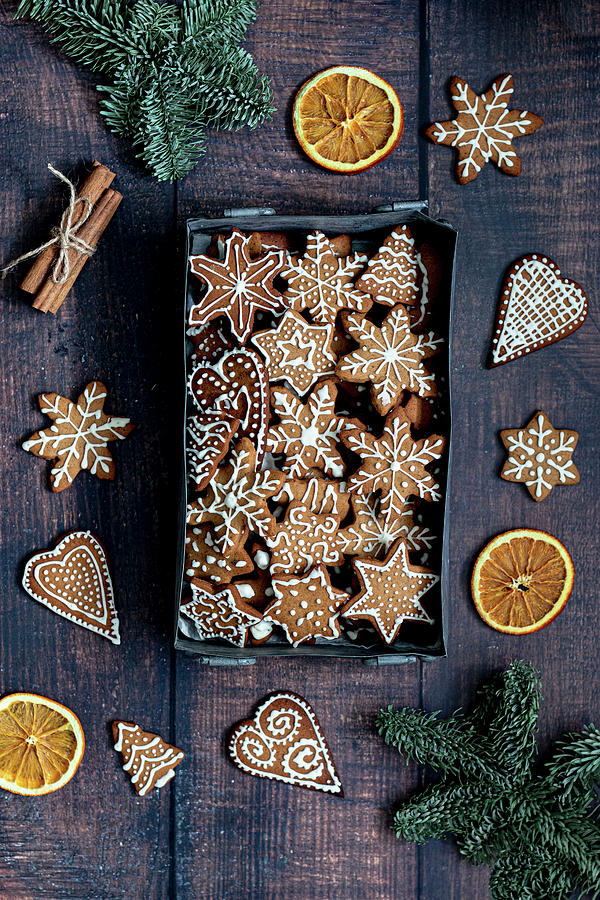 Christmas Gingerbread Cookies With Dried Oranges And Cinnamon Sticks #1 Photograph by Karolina Nicpon
