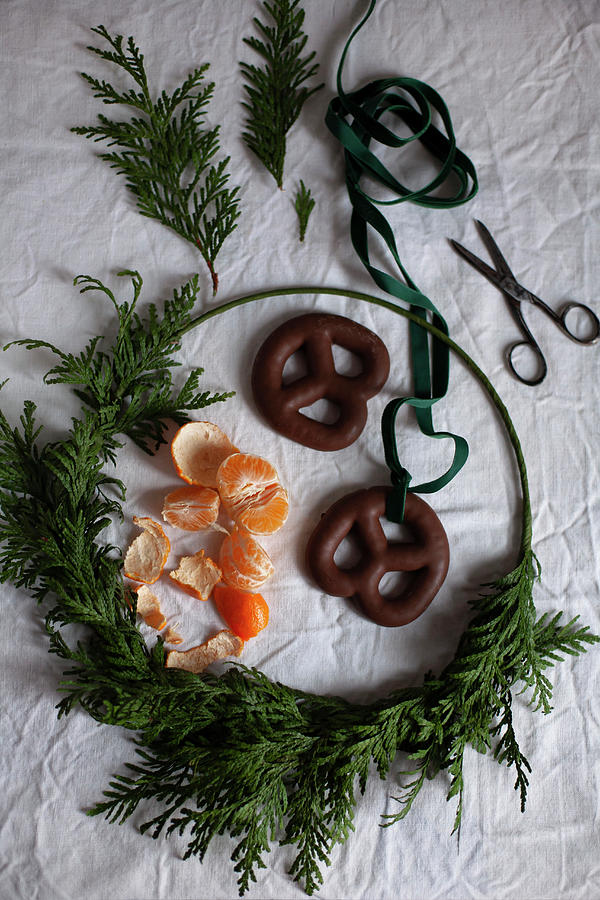 Christmas Wreath, Tangerine, Scissors And Gingerbread Pretzels #1 Photograph by Alicja Koll