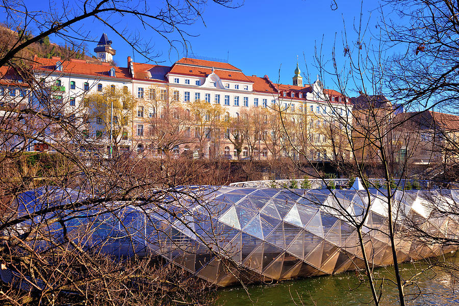 City of Graz Mur river island and Schlossberg hill view #1 Photograph by Brch Photography