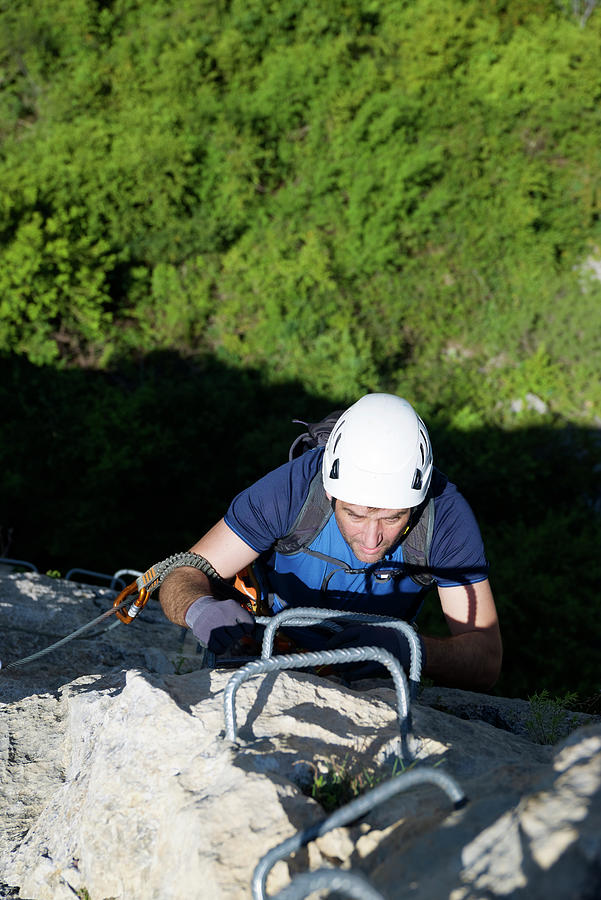 Nature Photograph - Climbing A Ferrata Route In Mascun Ravine In Guara Mountains. #1 by Cavan Images