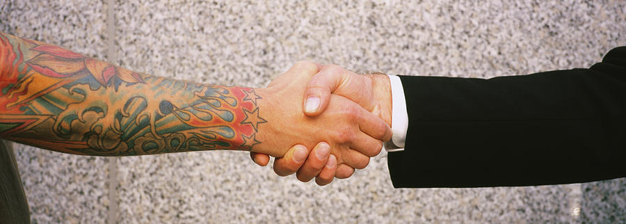 Close-up Of Two Men Shaking Hands #1 Photograph by Panoramic Images