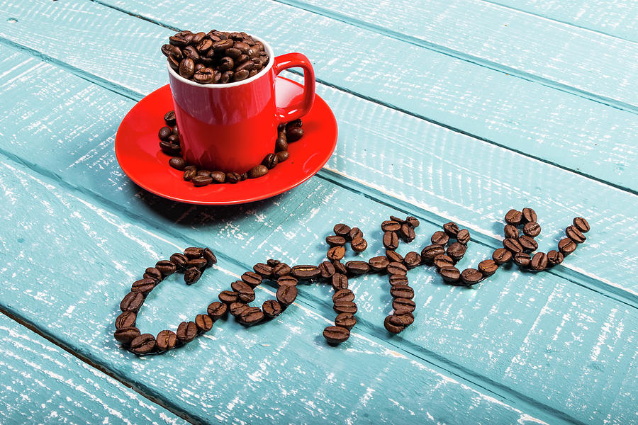 Coffee on a blue weathered table by Ben Gingell Coffee on a blue weathered table by Ben Gingell