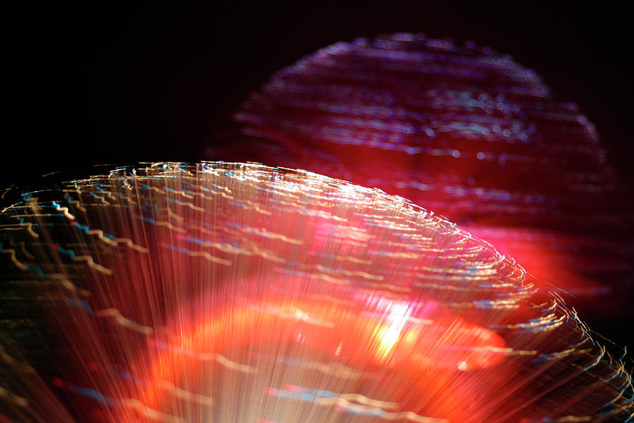 Coloured lights and motion blur abstract #1 Photograph by Seeables Visual Arts
