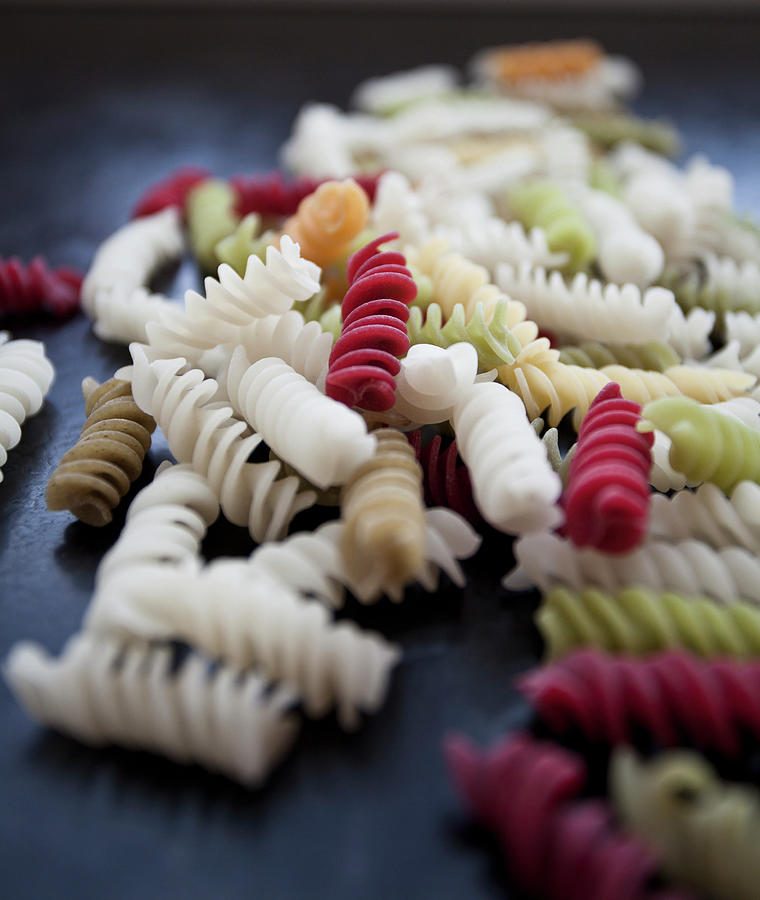 Colourful Fusili Pasta Made From Vegetables beet, Spinach, On A Black Countertop #1 Photograph by Ryla Campbell