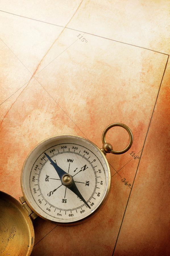 Compass On Old Map #1 Photograph by Dny59
