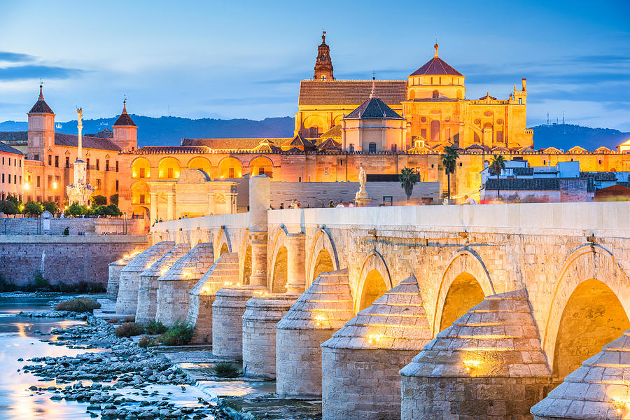 Architecture Photograph - Cordoba, Spain At The Roman Bridge #1 by Sean Pavone