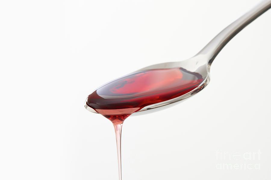 Cough Syrup Dripping From A Spoon #1 Photograph by Science Photo Library