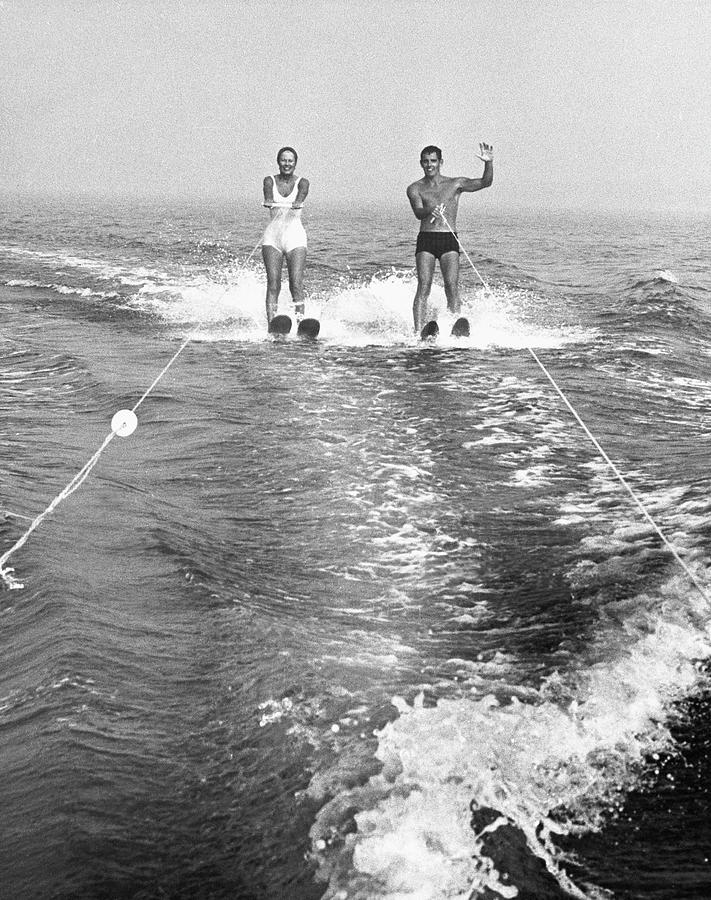 Couple Water Skiing #1 Photograph by George Marks
