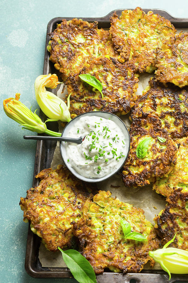 Courgette And Sweetcorn Fritters With Herb Cream Cheese Photograph by ...