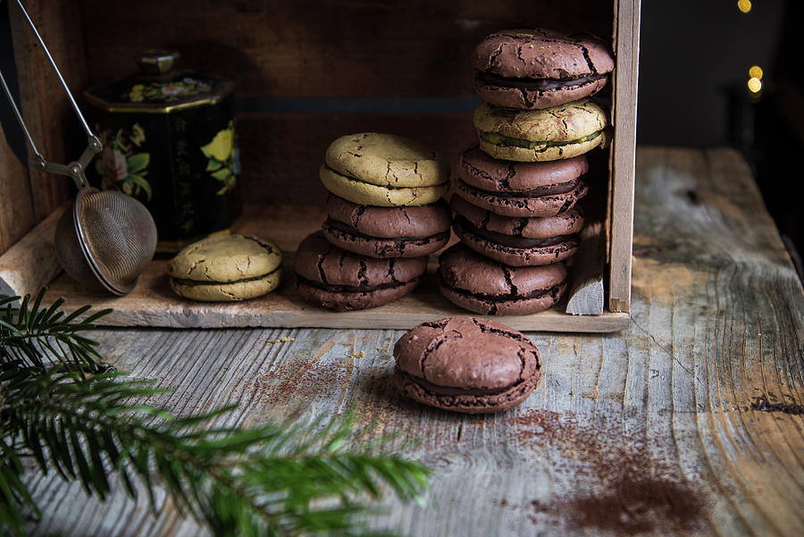 Cracked Macaroons On A Wooden Box Ready To Be Shared To Celebrate #1 Photograph by Myriam Meliani