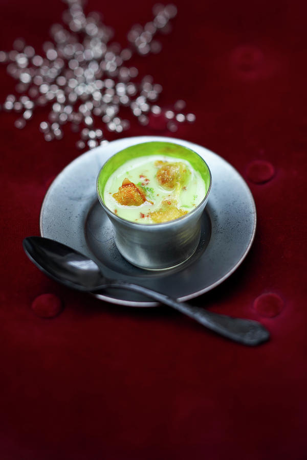 Cream Of Split Pea Soup With Raviolis And Walnut Oil #1 Photograph by Bilic