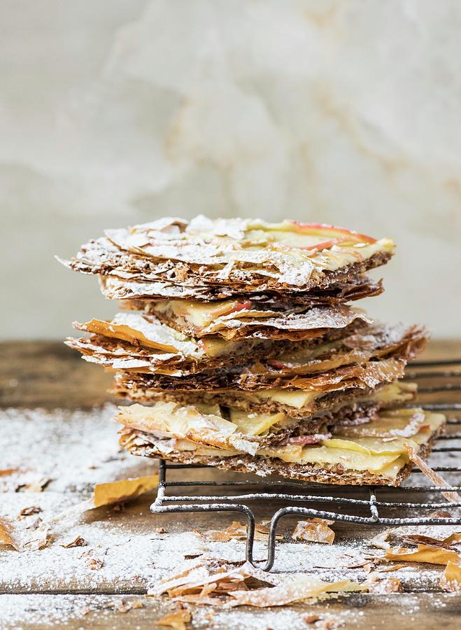 Crispy Filo Pastry Cake With Apple Slices And Icing Sugar #1 Photograph by Hein Van Tonder