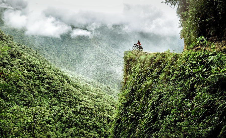 Cycling the death road in Bolivia #1 Photograph by Kamran Ali