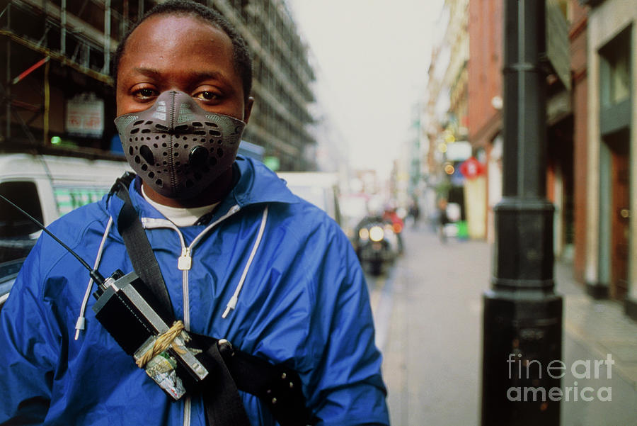 Cyclist Wearing A Fume Mask. #1 Photograph by Joe Pasieka/science Photo Library