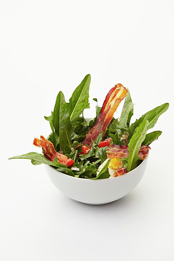 Dandelion Leaf Salad With Tomatoes, Hard-boiled Eggs And Fried Bacon #1 Photograph by Herbert Lehmann