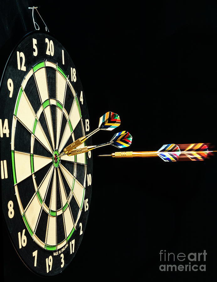 Dart In Flight Towards Dartboard Photograph by Martyn F. Chillmaid