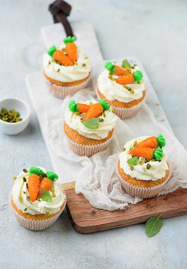 Decorated Cream Cheese Cupcakes With Pistachios #1 Photograph by Ewgenija Schall