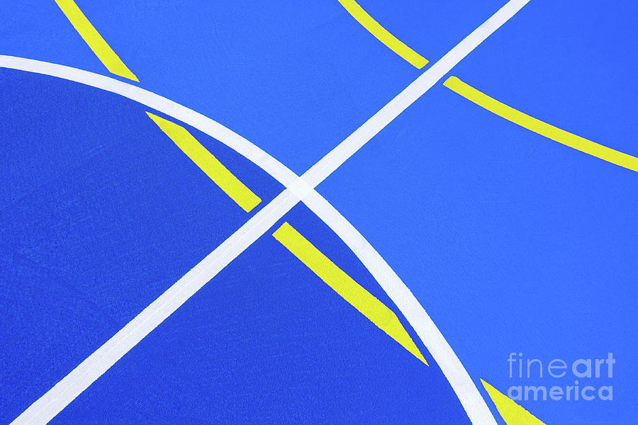 Design of a sports field, with blue background and red and yello #1 Photograph by Joaquin Corbalan