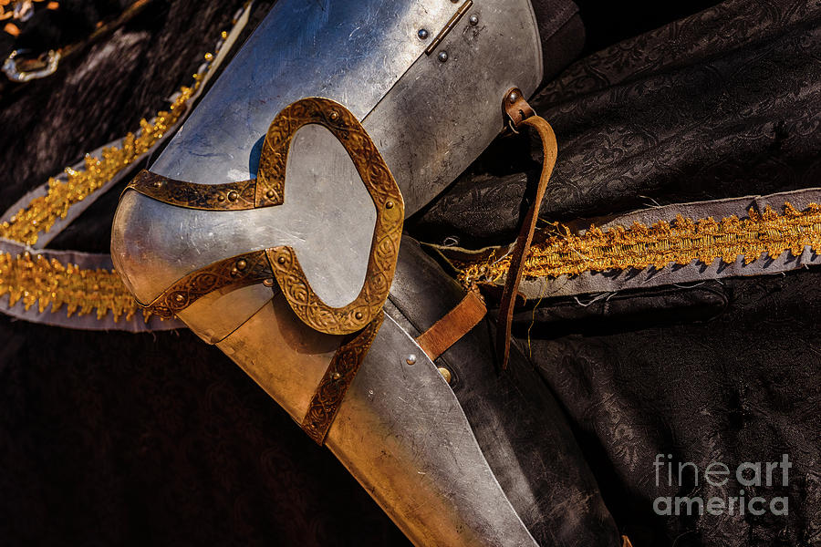 Detail of the armor of a knight mounted on horseback during a display at a medieval festival. #1 Photograph by Joaquin Corbalan